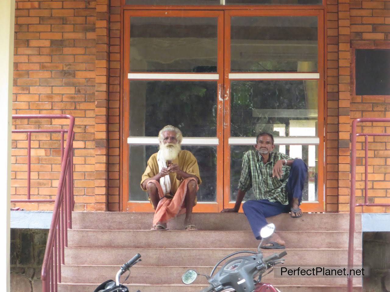 Men sitting in the Ashram